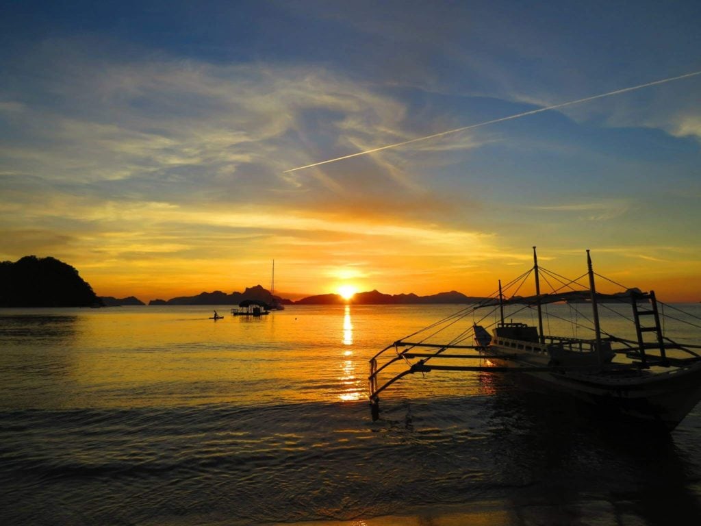 sunset on el nido beach where we started our travel blog (1)