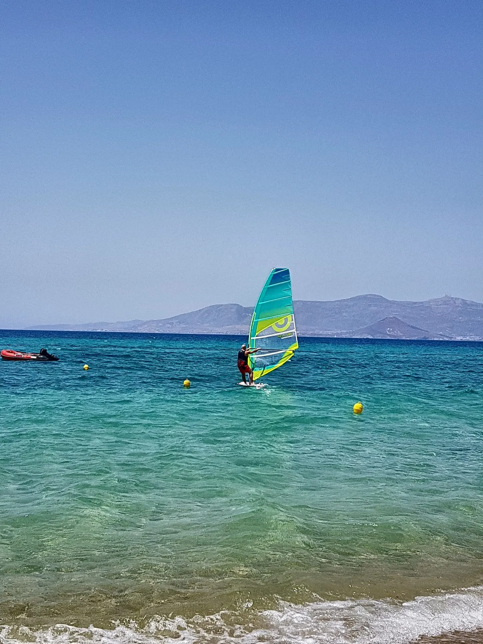 Things To Do In Naxos - 10 Amazing Places You Need To Explore - Surfing in Plaka beach